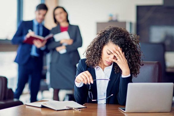 https___www.istockphoto.com_photo_burnout-businesswoman-under-pressure-in-the-office-gm1169045092-323007849_phrase=Toxic+Work+Environment